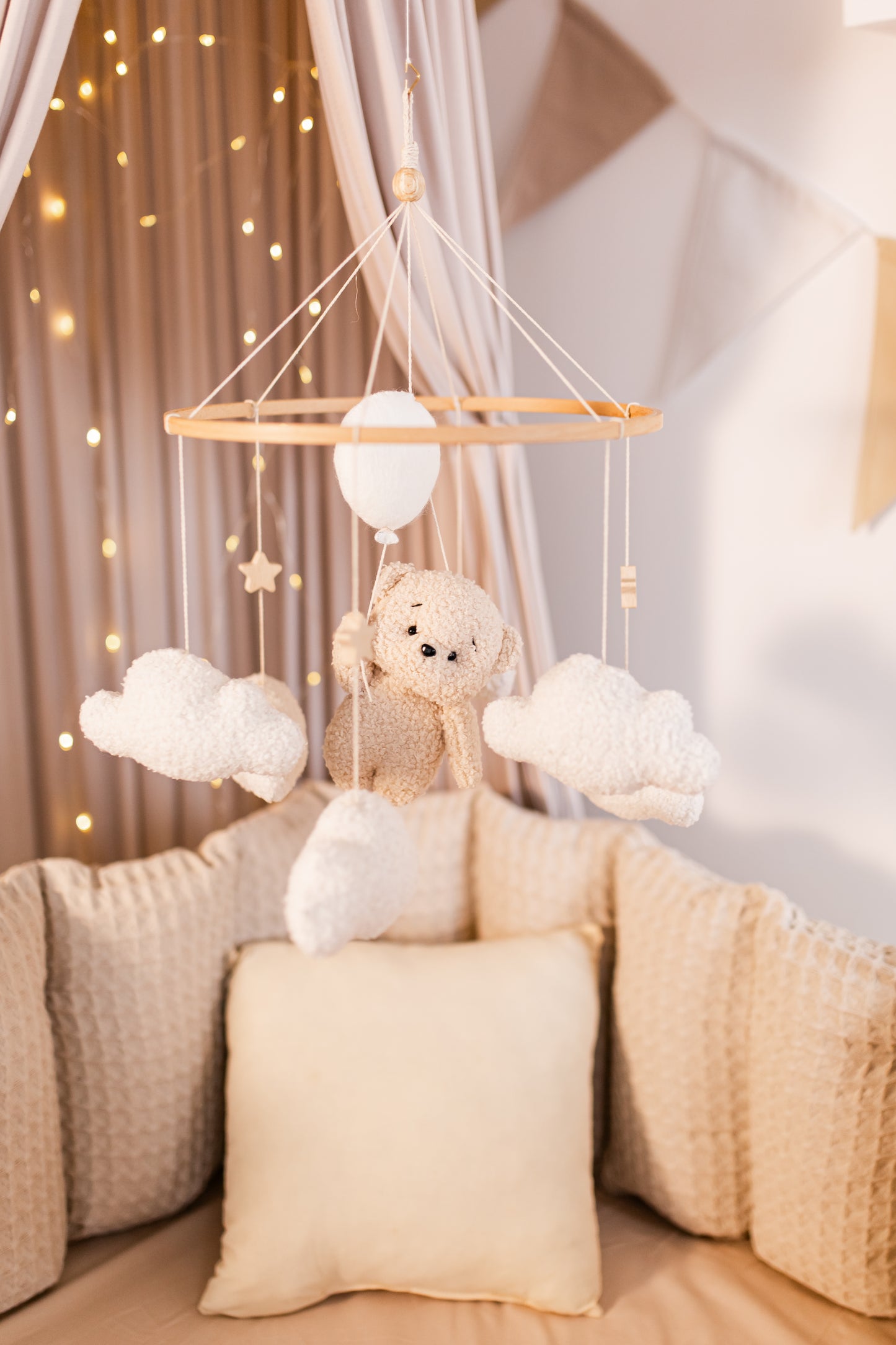 Handmade boucle balloon bear nursery mobile in dreamy neutral tones