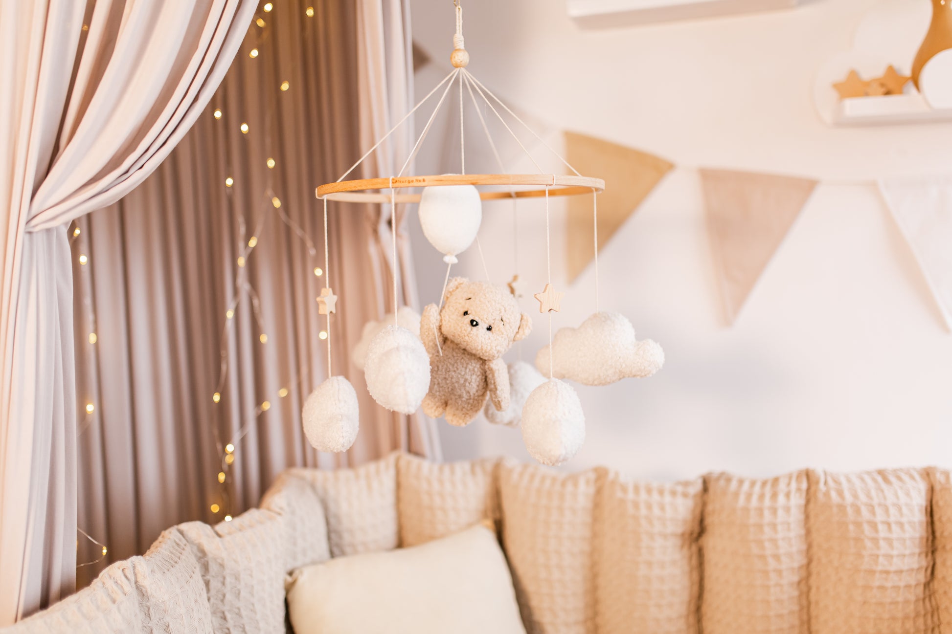 Eco-friendly balloon bear and cloud mobile for whimsical baby room
