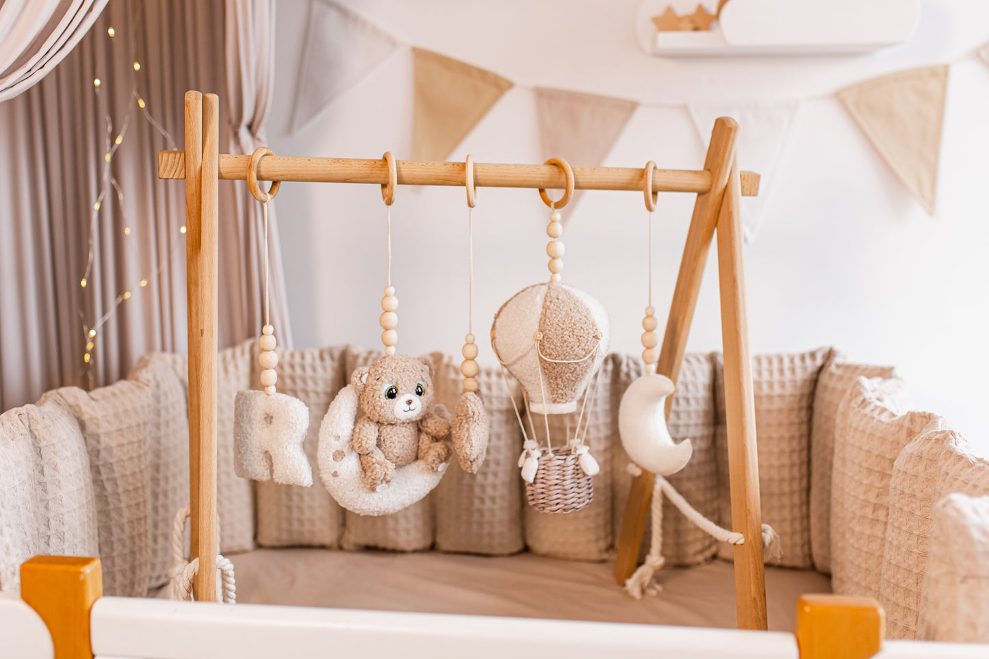 Baby gym with hanging toys in a nursery setting