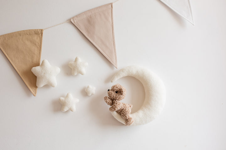 Handmade bouclé teddy bear on moon nursery wall decoration with Velcro mounting