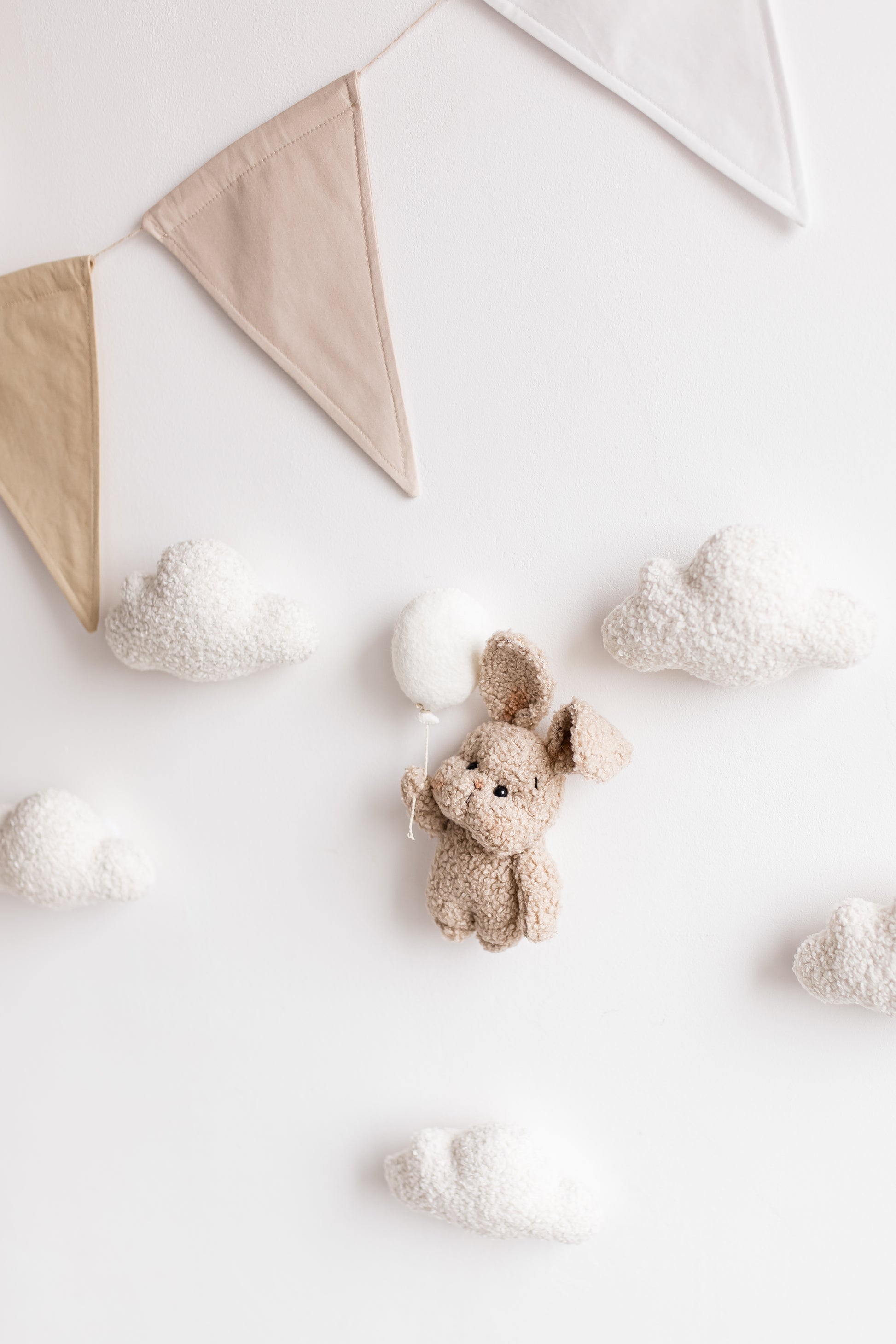 Handmade bouclé bunny and balloons wall decoration for nursery