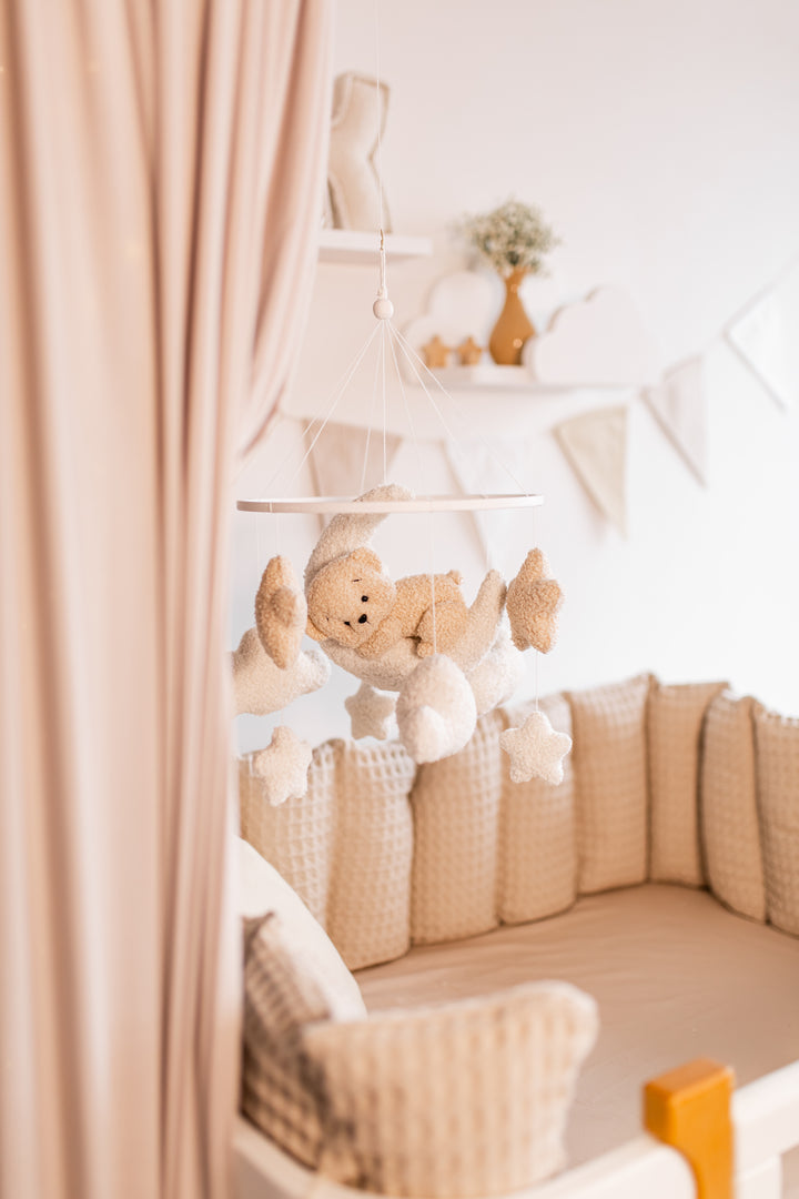 Handmade boucle crescent nursery mobile with dreamy celestial design