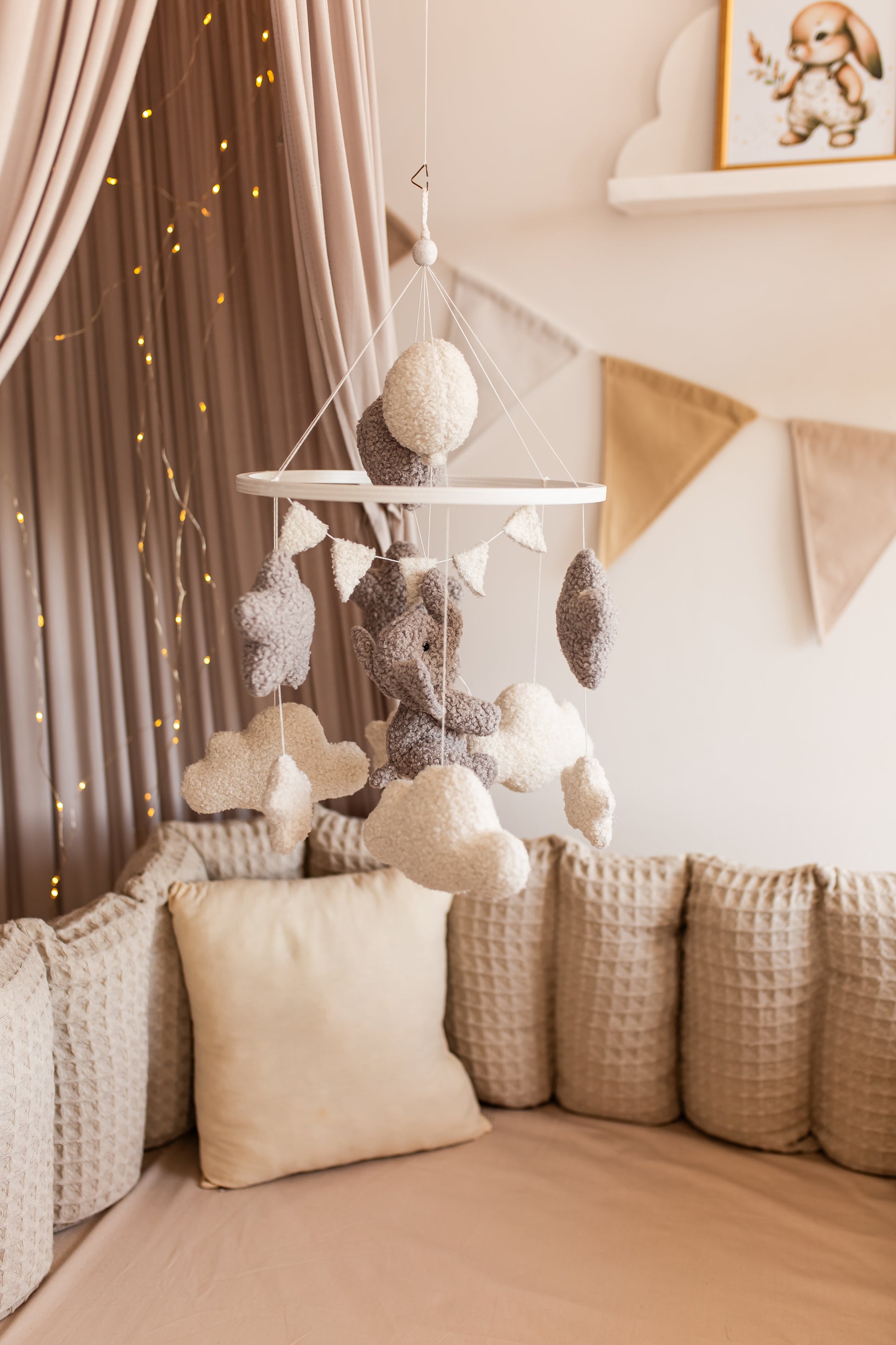 Handmade boucle elephant nursery mobile in soft neutral colors