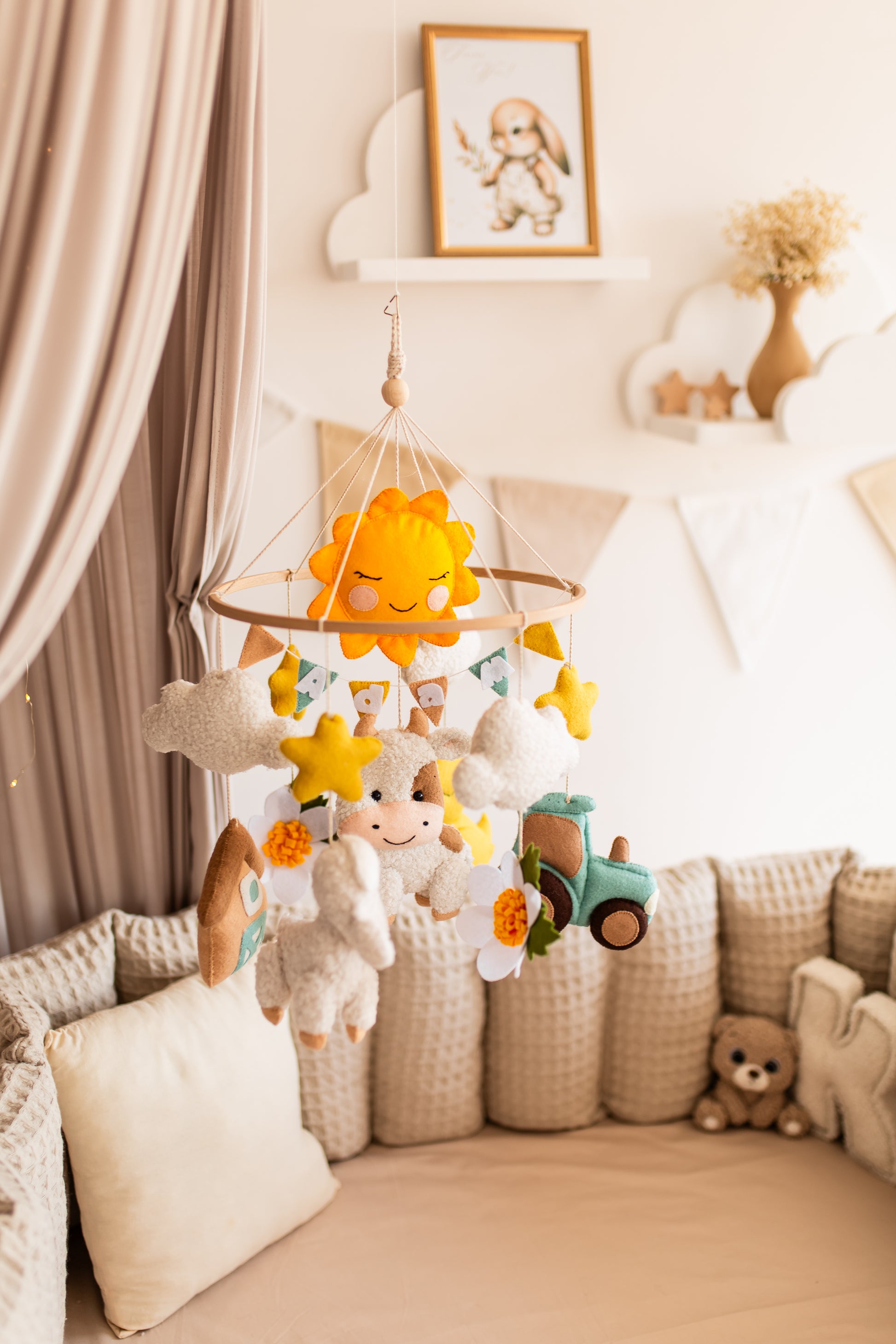 Eco-friendly farm animal baby mobile hanging above crib