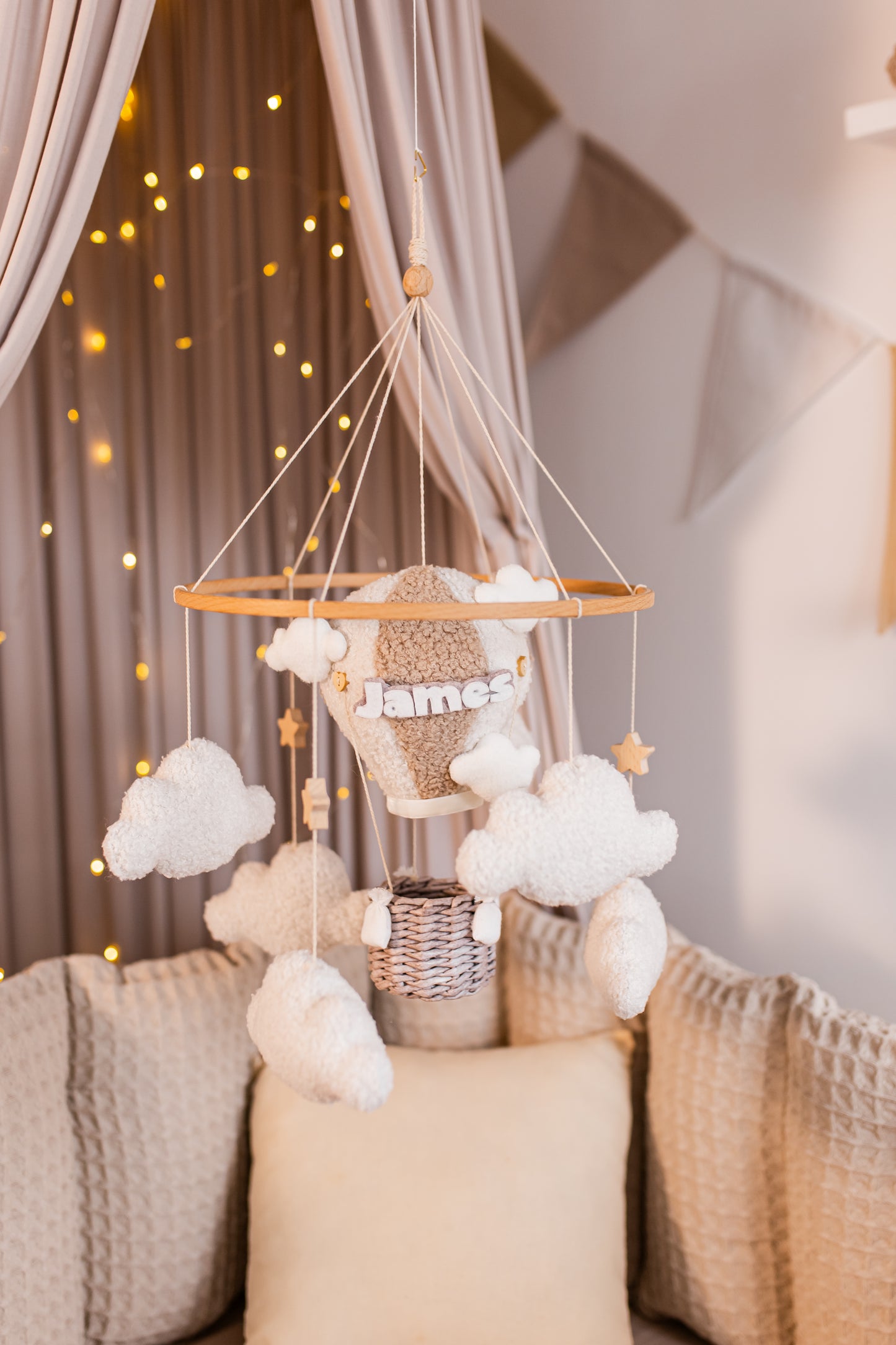 Handmade boucle hot air balloon nursery mobile with custom name detail
