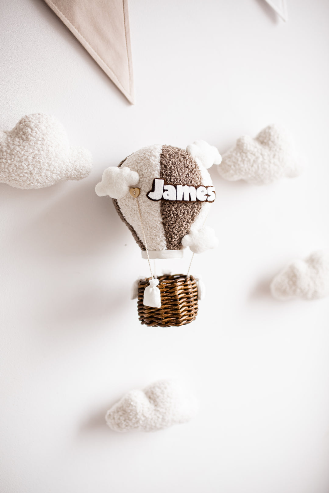 Cozy nursery wall decor set featuring hot air balloon and clouds with gentle illumination