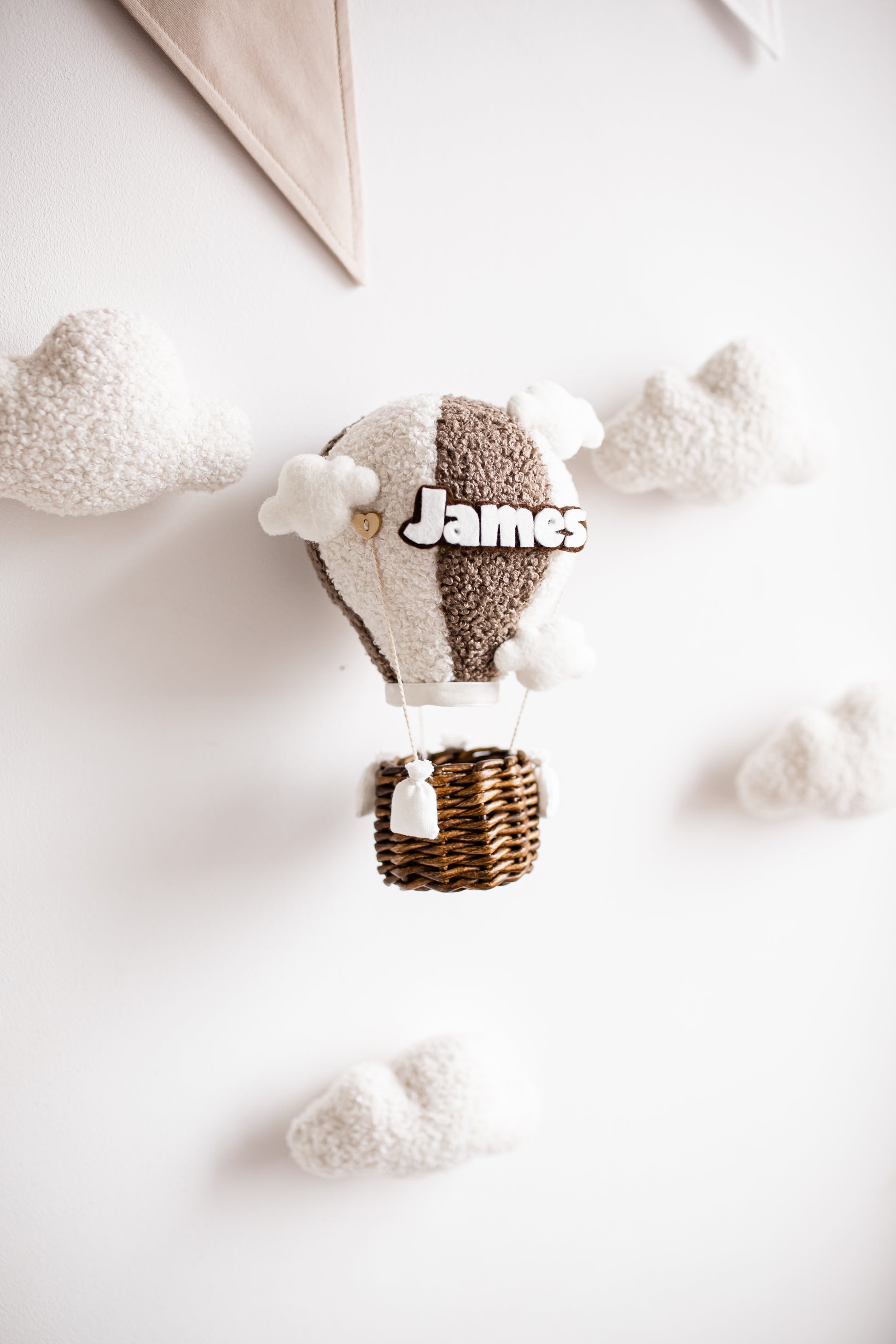 Cozy nursery wall decor set featuring hot air balloon and clouds with gentle illumination