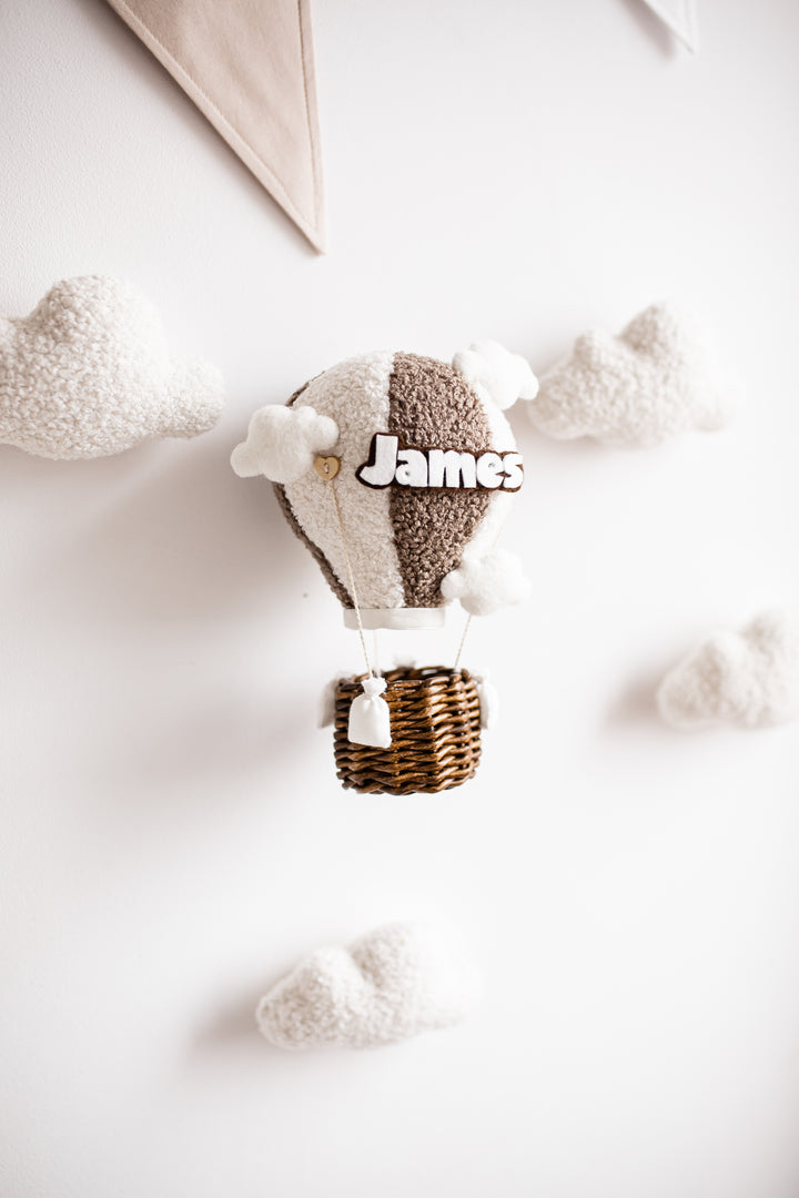 Cozy nursery wall decor set featuring hot air balloon and clouds with gentle illumination