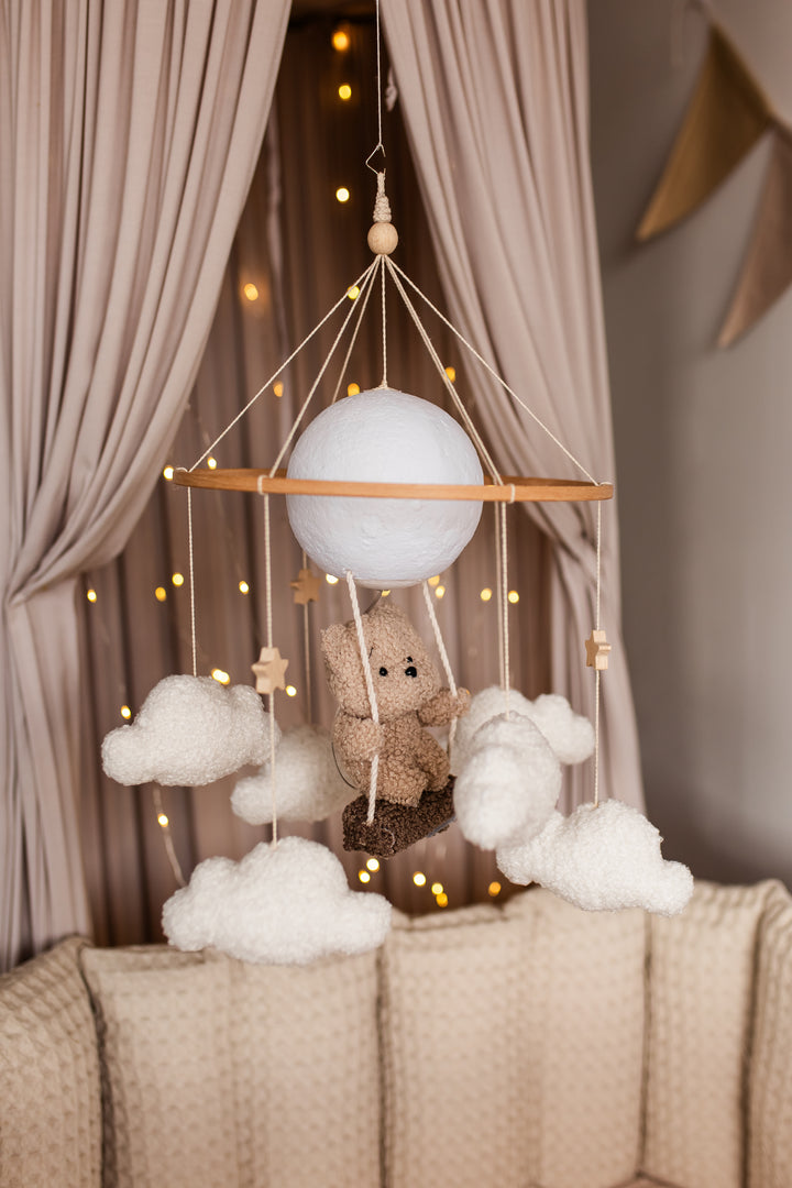 Nursery night light teddy bear on a swing baby crib mobile