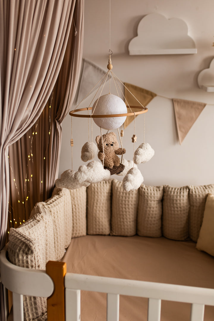 Nursery night light teddy bear on a swing baby crib mobile