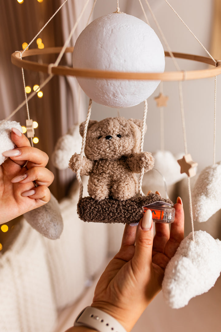 Nursery night light teddy bear on a swing baby crib mobile
