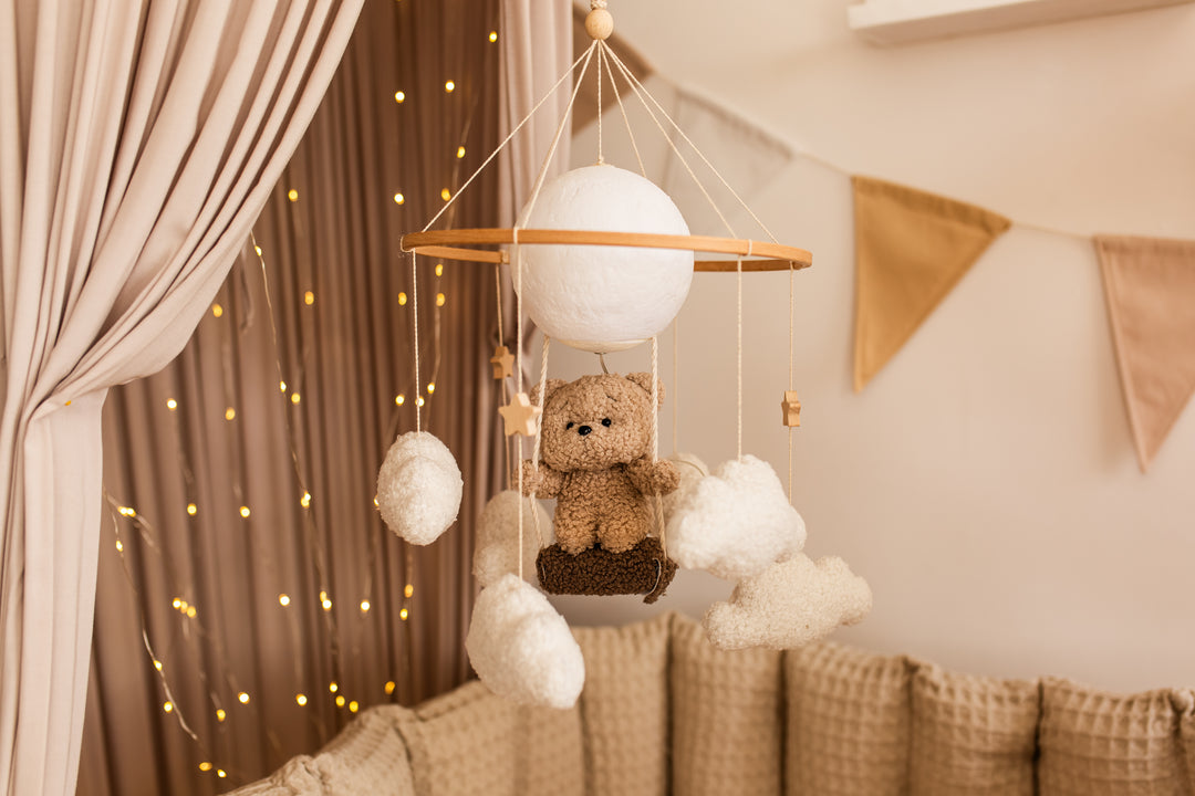 Nursery night light teddy bear on a swing baby crib mobile