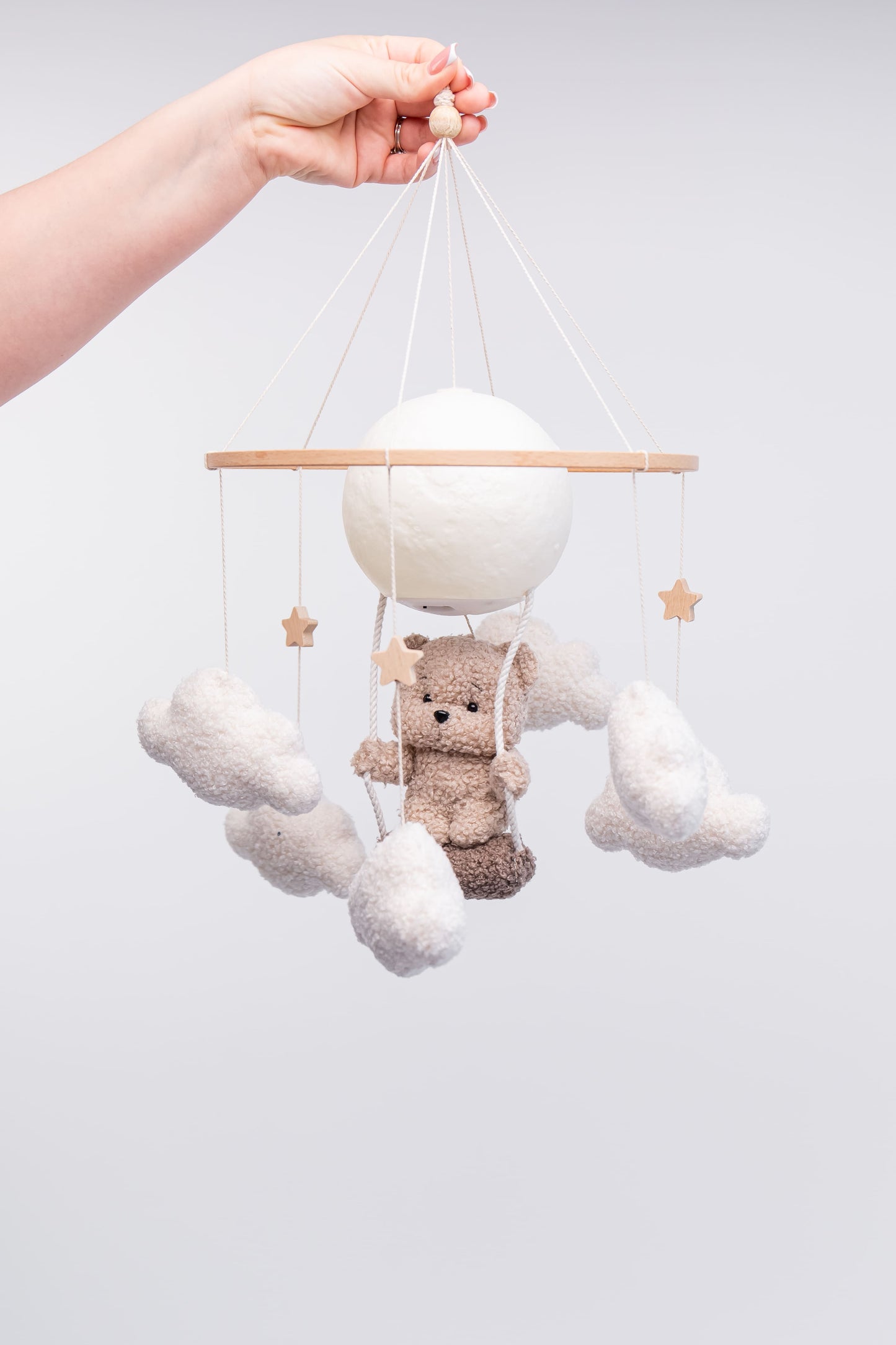 Nursery night light teddy bear on a swing baby crib mobile