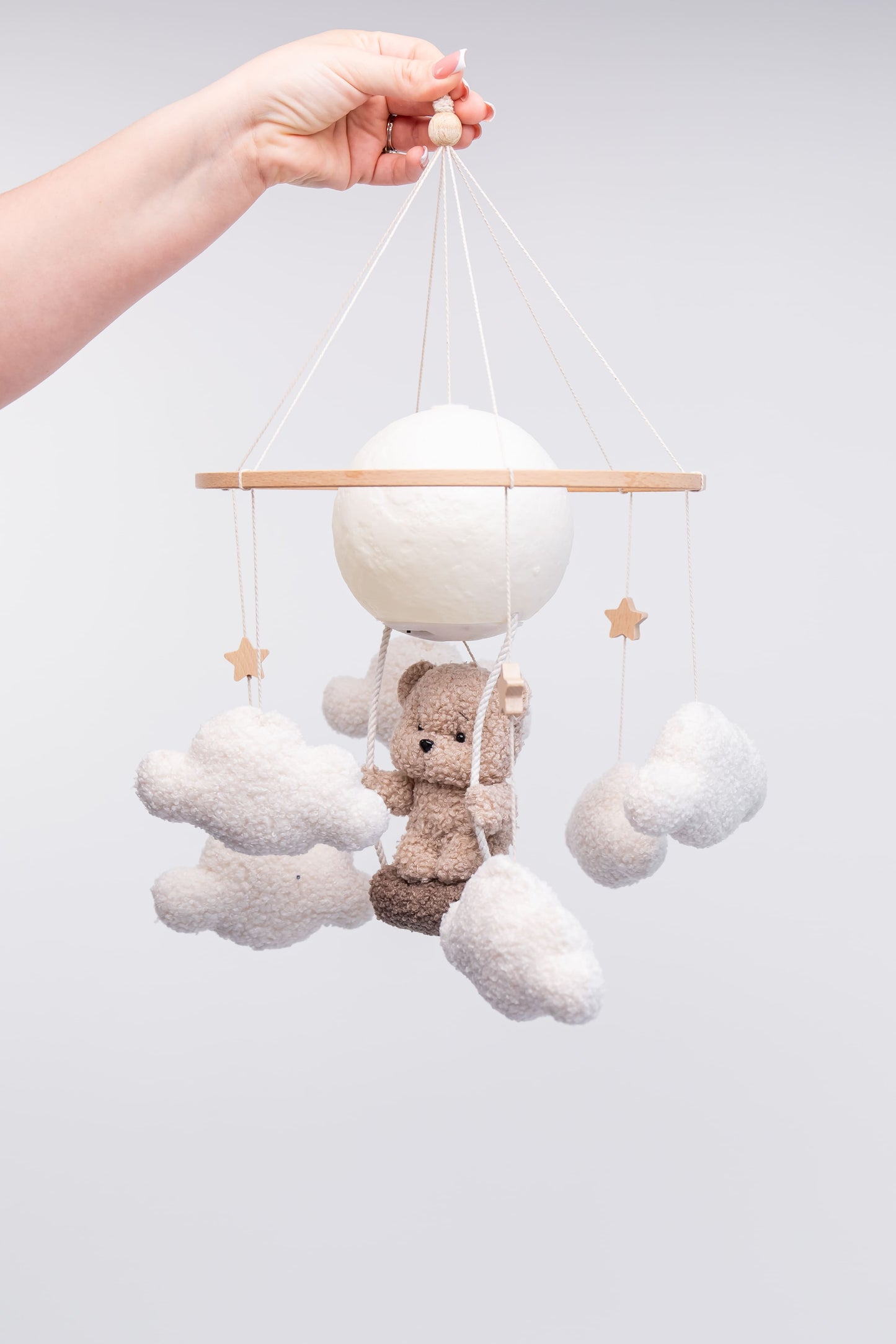 Nursery night light teddy bear on a swing baby crib mobile