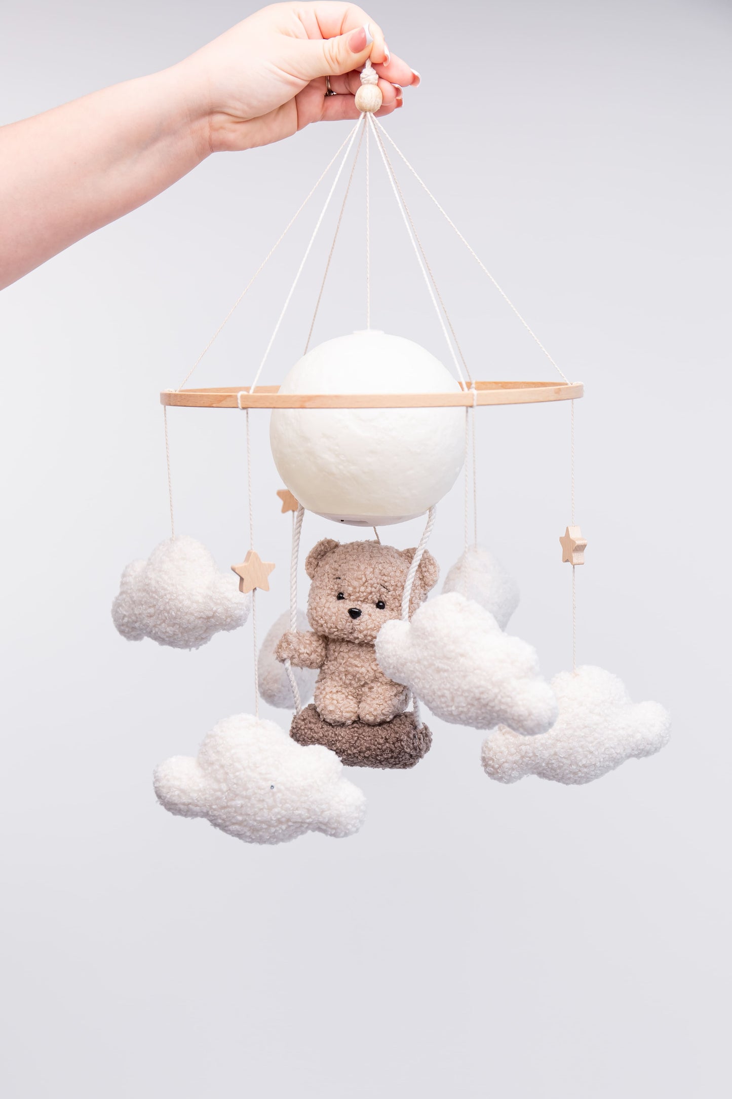 Nursery night light teddy bear on a swing baby crib mobile