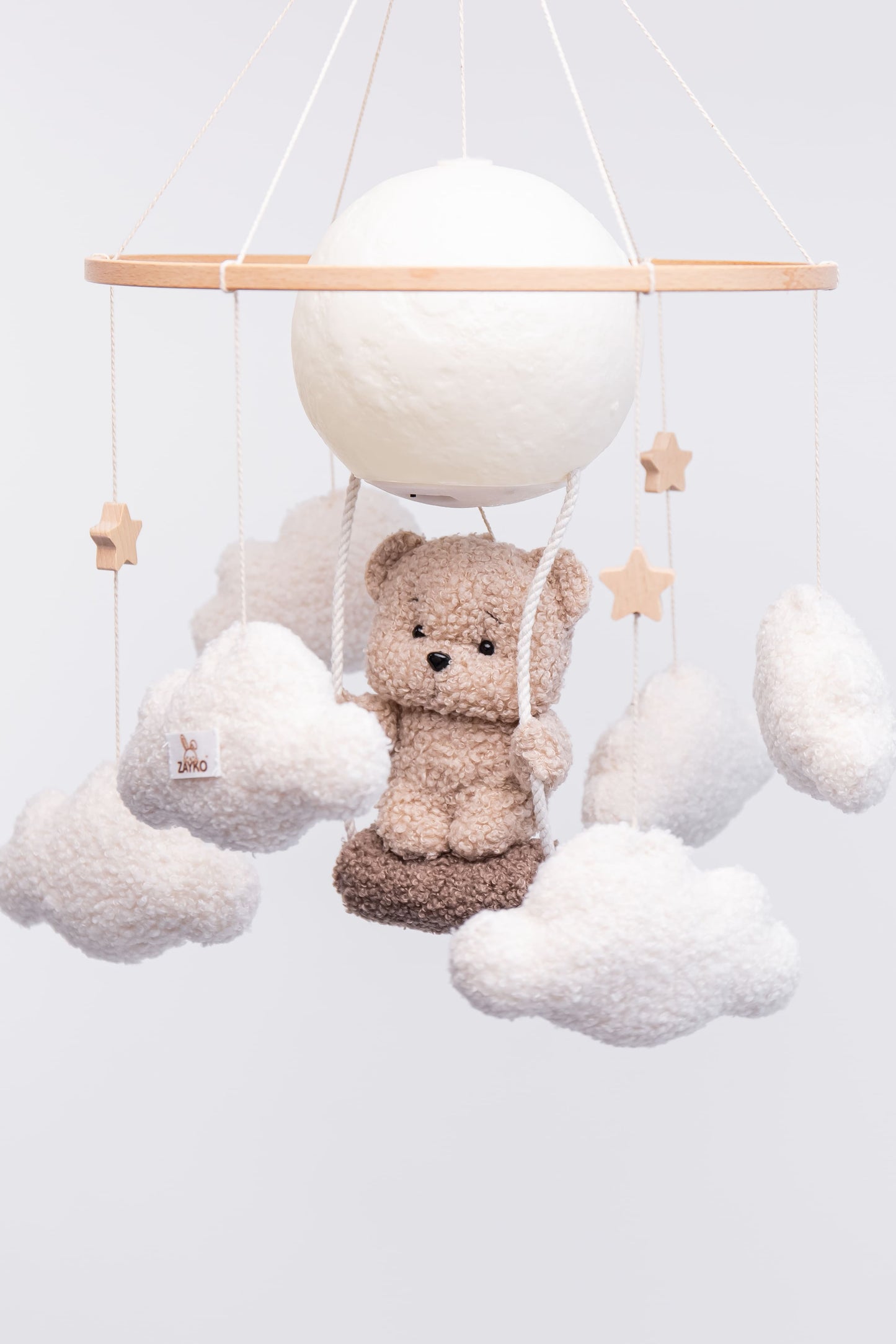 Nursery night light teddy bear on a swing baby crib mobile