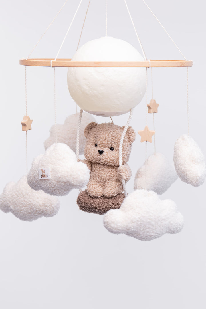 Nursery night light teddy bear on a swing baby crib mobile