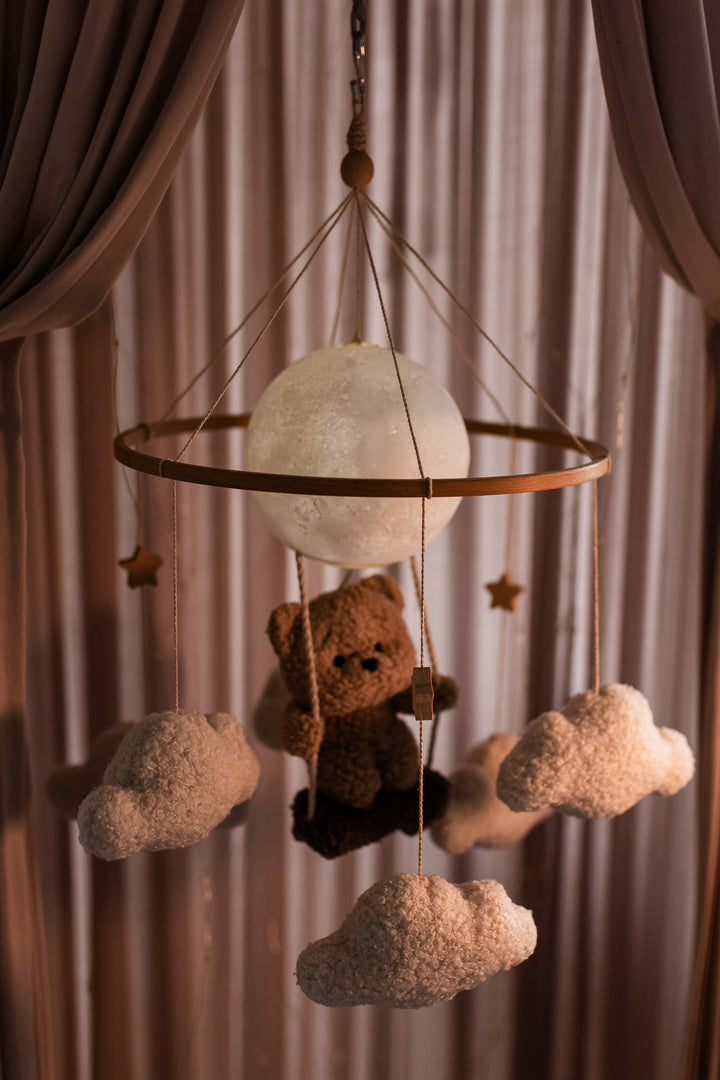 Nursery night light teddy bear on a swing baby crib mobile