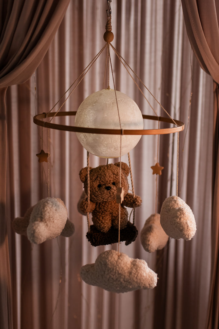 Nursery night light teddy bear on a swing baby crib mobile
