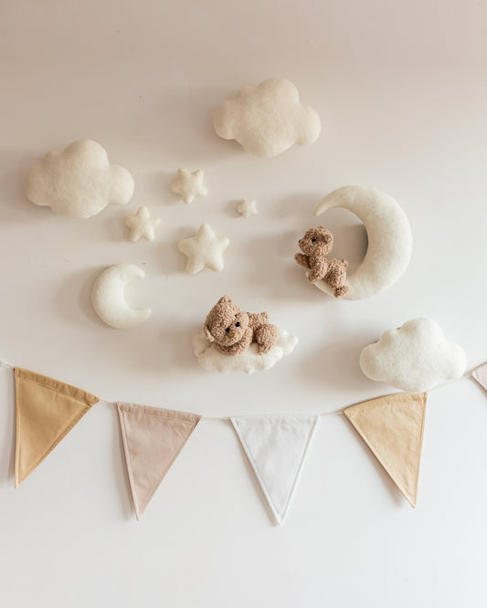 Bouclé two teddy bears wall décor set with clouds and stars near nursery crib